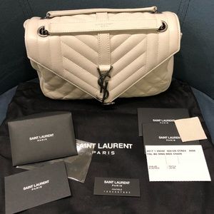 Authentic YSL Monogramed Medium Sling bag.
